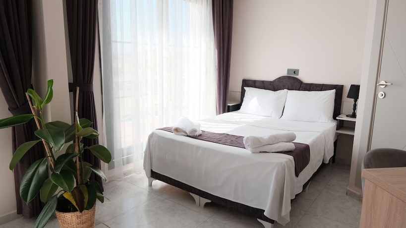 Imagen de la habitación del Marina Lora Butik Otel Sığacık. Foto 2