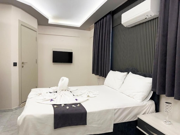 Imagen de la habitación del Marina Lora Butik Otel Sığacık. Foto 11