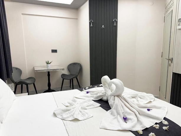 Imagen de la habitación del Marina Lora Butik Otel Sığacık. Foto 13