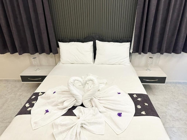 Imagen de la habitación del Marina Lora Butik Otel Sığacık. Foto 15