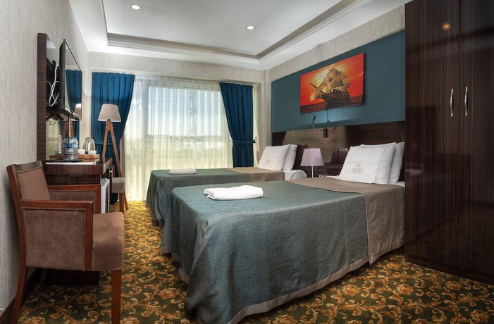 Imagen de la habitación del Marinn Deluxe Hotel. Foto 9