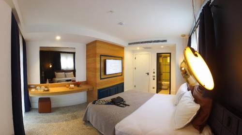 Imagen de la habitación del Maroon Tomtom. Foto 17