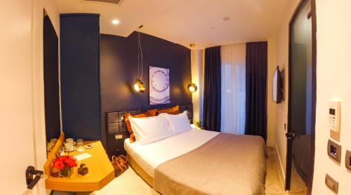 Imagen de la habitación del Maroon Tomtom. Foto 20