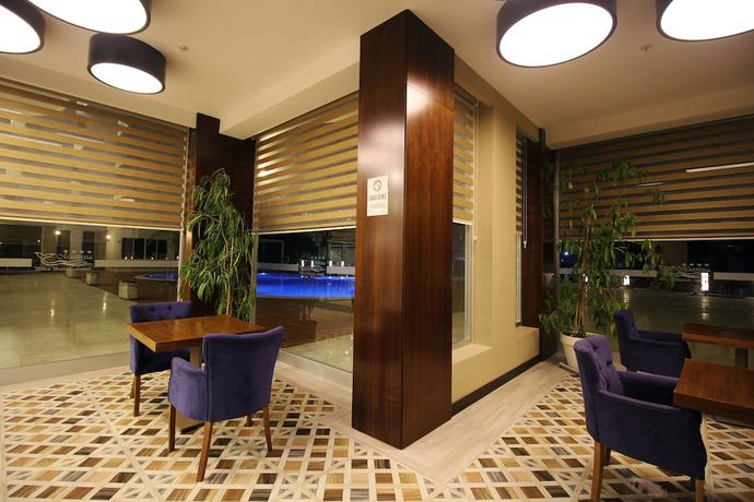 Imagen del bar/restaurante del Marpessa Blue Beach Resort and SPA Hotel. Foto 3