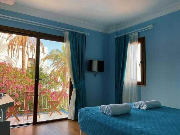 Imagen de la habitación del Marquis Blue Hotel. Foto 16