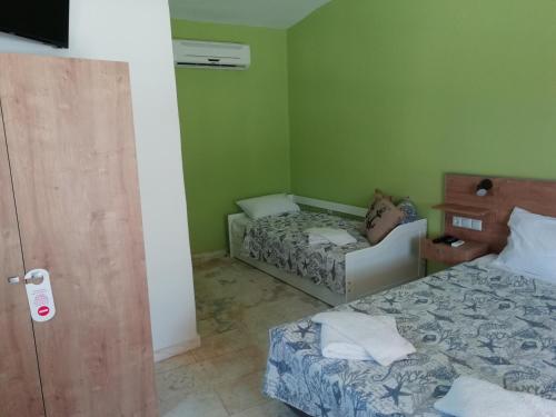 Imagen de la habitación del Marti Resort. Foto 9