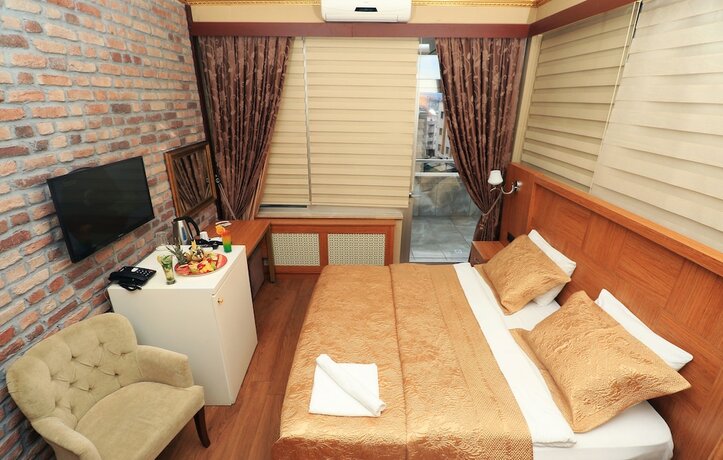 Imagen de la habitación del Marvell City Otel. Foto 15
