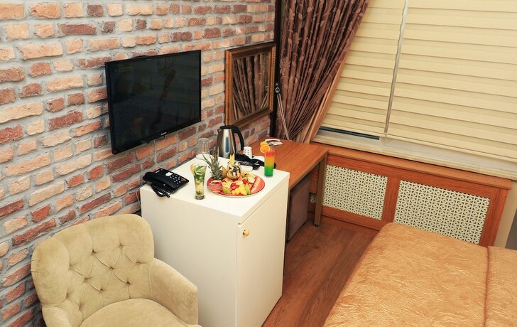 Imagen de la habitación del Marvell City Otel. Foto 19