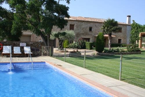 Imagen de la piscina del Masia Rural Can Poch. Foto 7