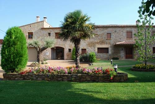 Imagen de los exteriores del Masia Rural Can Poch. Foto 6