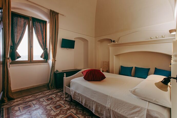 Imagen de la habitación del Masseria La Sterpina. Foto 14