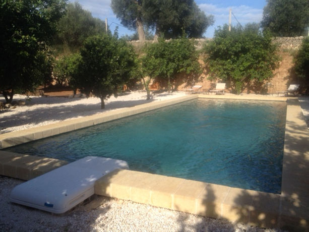 Imagen de la piscina del Masseria Lama Di Coccaro. Foto 7