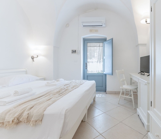 Imagen de la habitación del Masseria Lamagrotte By Raro Rooms. Foto 2
