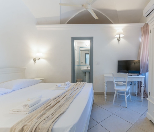 Imagen de la habitación del Masseria Lamagrotte By Raro Rooms. Foto 12