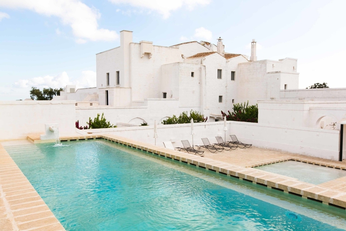 Imagen de la piscina del Masseria Le Carrube. Foto 19