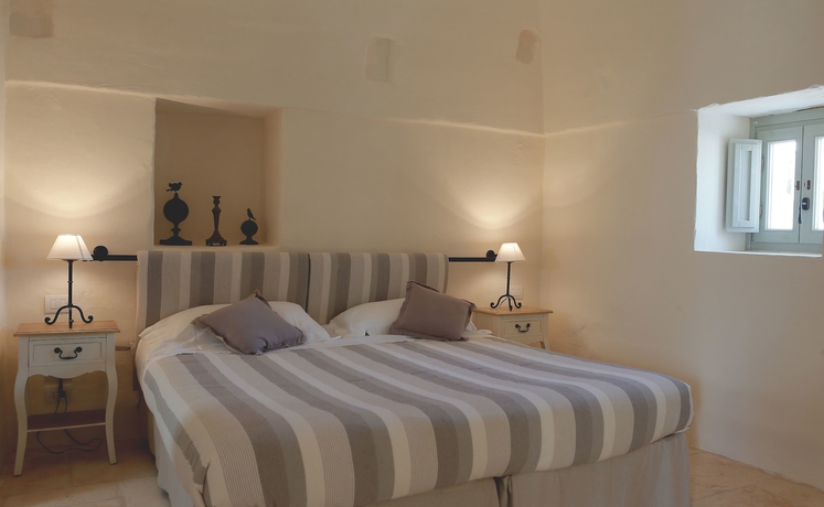 Imagen de la habitación del Masseria Le Carrube. Foto 11