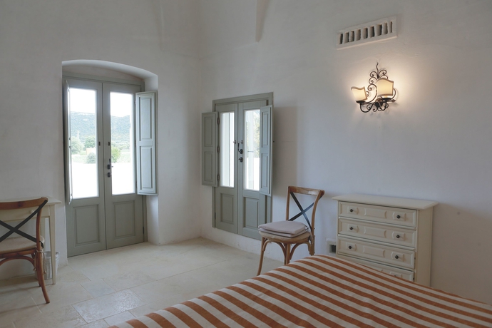 Imagen de la habitación del Masseria Le Carrube. Foto 12