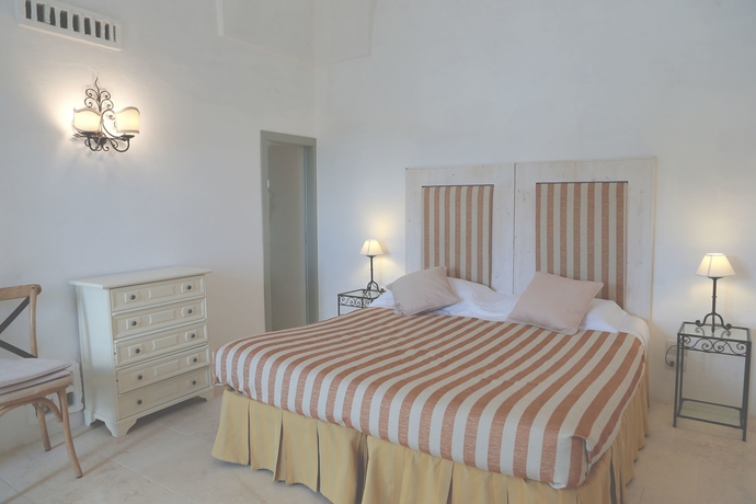 Imagen de la habitación del Masseria Le Carrube. Foto 13