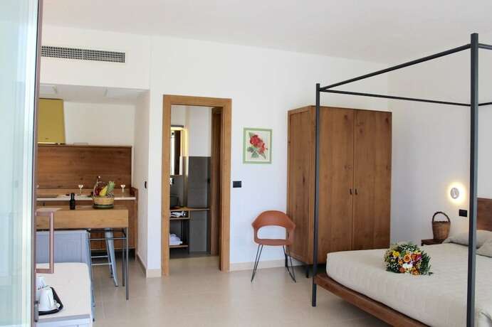 Imagen de la habitación del Masseria Rifisa AgriResort. Foto 15