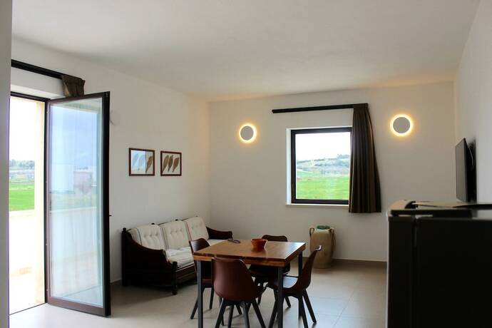 Imagen de la habitación del Masseria Rifisa AgriResort. Foto 16