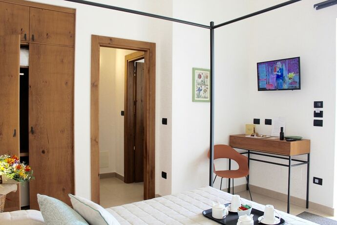 Imagen de la habitación del Masseria Rifisa AgriResort. Foto 19