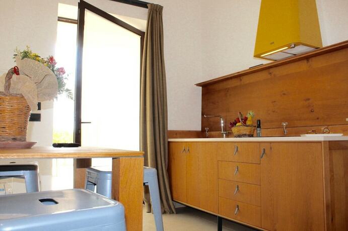 Imagen de la habitación del Masseria Rifisa AgriResort. Foto 20