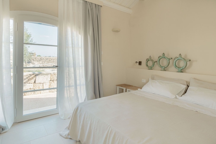 Imagen de la habitación del Masseria Vaccaro Boutique Hotel. Foto 6