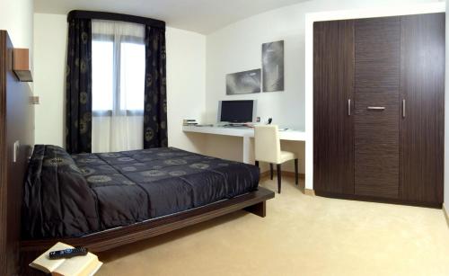 Imagen de la habitación del Matrix Hotel and Residence. Foto 8