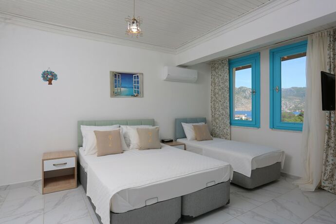 Imagen de la habitación del Mavi Melek Hotel. Foto 16