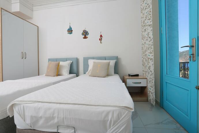 Imagen de la habitación del Mavi Melek Hotel. Foto 17