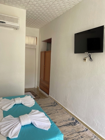 Imagen de la habitación del Maviay Adrasan Hotel. Foto 10