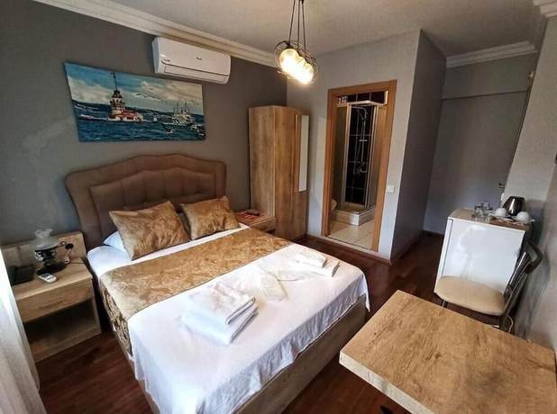 Imagen de la habitación del Mavilla Hotel. Foto 15