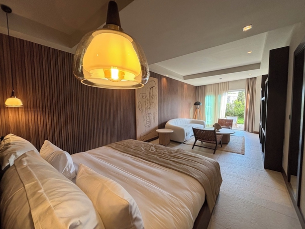 Imagen de la habitación del Mavilu Luxury Hotel. Foto 14