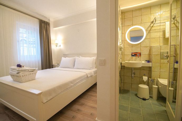 Imagen de la habitación del Mavrella Bozcaada. Foto 17