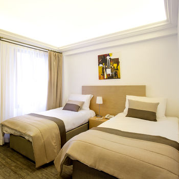 Imagen de la habitación del Mb City Hotel. Foto 12