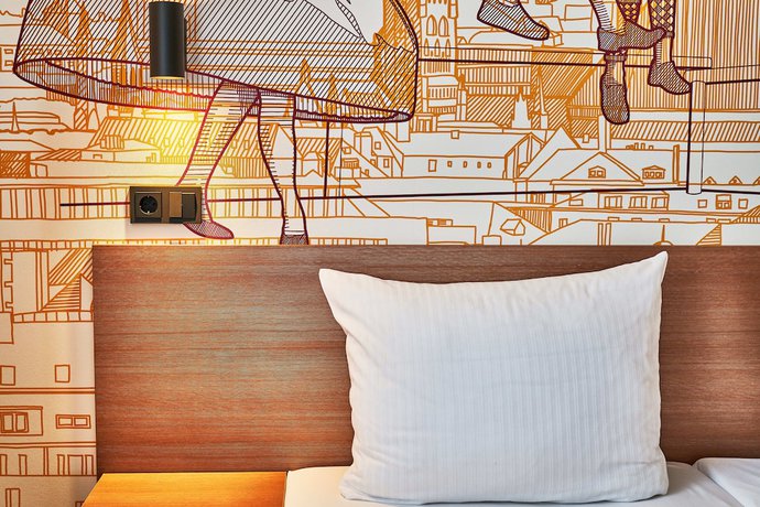 Imagen de la habitación del McDreams Hotel München Messe. Foto 6