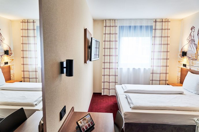 Imagen de la habitación del McDreams Hotel München Messe. Foto 12