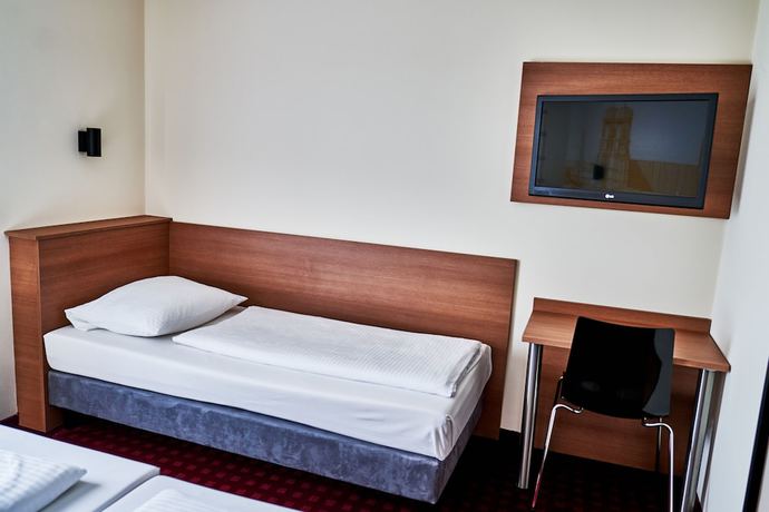 Imagen de la habitación del McDreams Hotel München Messe. Foto 14