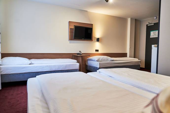 Imagen de la habitación del McDreams Hotel München Messe. Foto 15