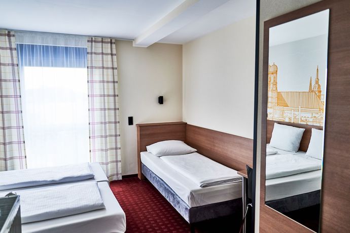Imagen de la habitación del McDreams Hotel München Messe. Foto 18