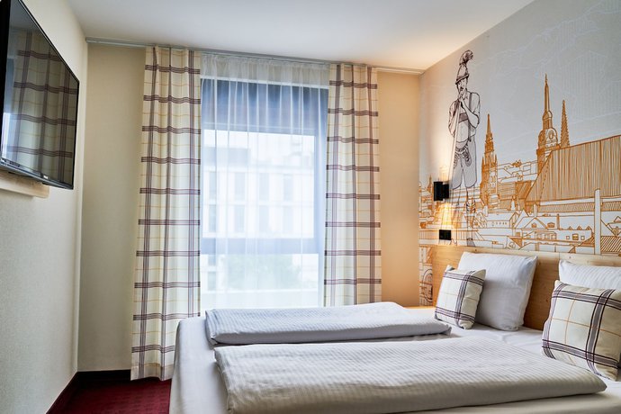 Imagen de la habitación del McDreams Hotel München Messe. Foto 19
