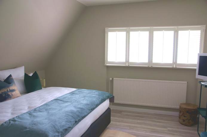 Imagen de la habitación del Meinsbur Boutique Hotel. Foto 5