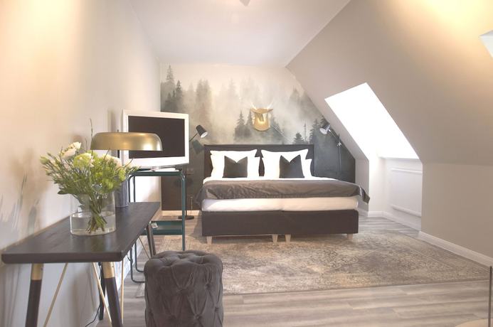Imagen de la habitación del Meinsbur Boutique Hotel. Foto 15