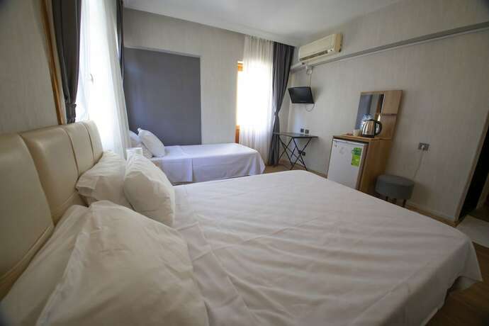 Imagen de la habitación del Mekan Otel Villa. Foto 13