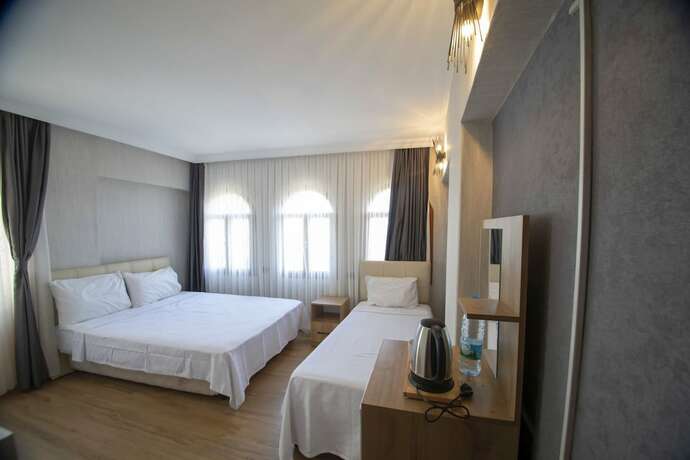 Imagen de la habitación del Mekan Otel Villa. Foto 14