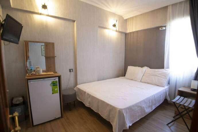Imagen de la habitación del Mekan Otel Villa. Foto 15