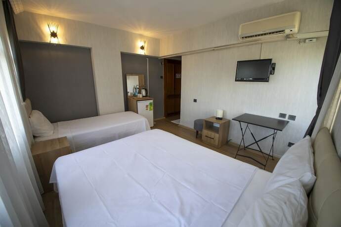 Imagen de la habitación del Mekan Otel Villa. Foto 17
