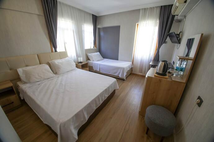 Imagen de la habitación del Mekan Otel Villa. Foto 18