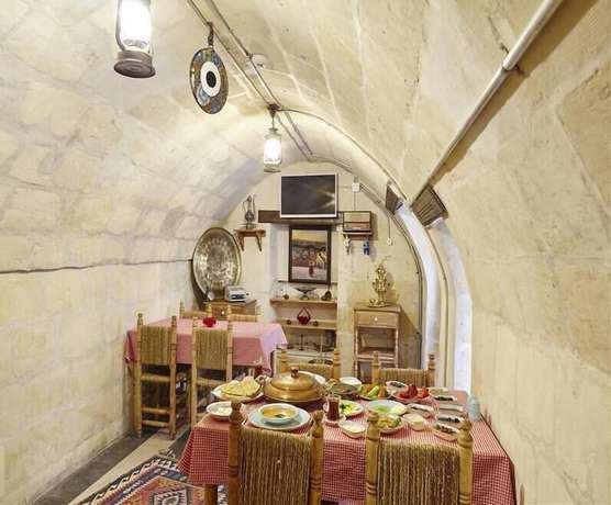 Imagen del bar/restaurante del Melek Lara Butik Hotel. Foto 4