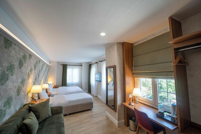 Imagen de la habitación del Mell City Suite Hotel. Foto 15